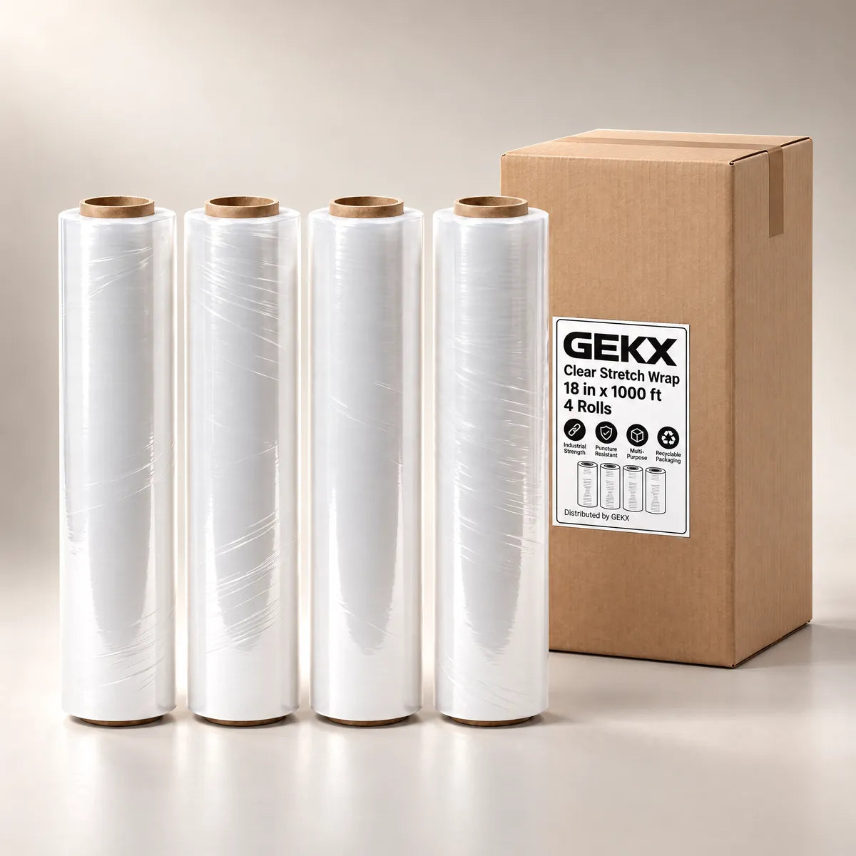 GEKX clear stretch wrap: four 18 in rolls beside a closed GEKX 4-roll shipping box